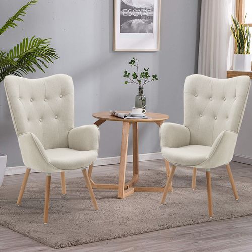 Fauteuil Scandinave Avec Un Revêtement En Tissu Accoudoirs Rembourés Et Des Pieds En Bois Massif